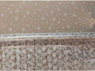 Folia do pakowania prezentw POLSYR rolka 25ark. B1 70x100cm - Biae nieynki